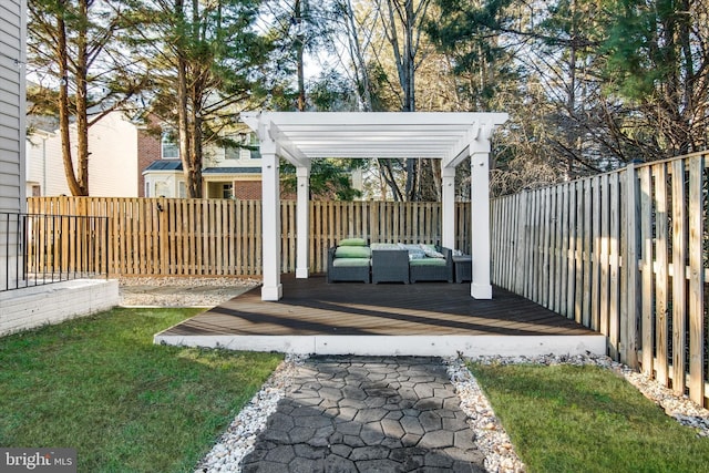 view of yard featuring a deck, an outdoor hangout area, a fenced backyard, and a pergola