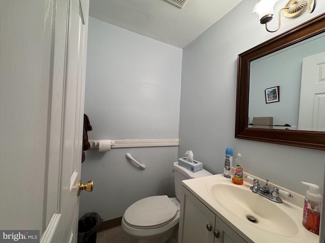 half bath with toilet and vanity