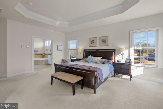 bedroom with baseboards, a raised ceiling, ornamental molding, and carpet flooring