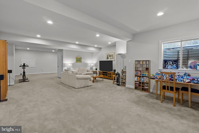 living area with recessed lighting, baseboards, and light carpet