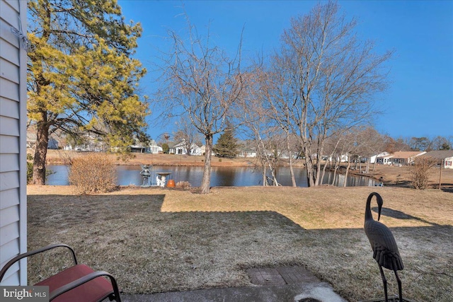 view of yard with a water view