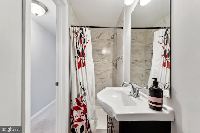 bathroom with vanity and a shower with shower curtain