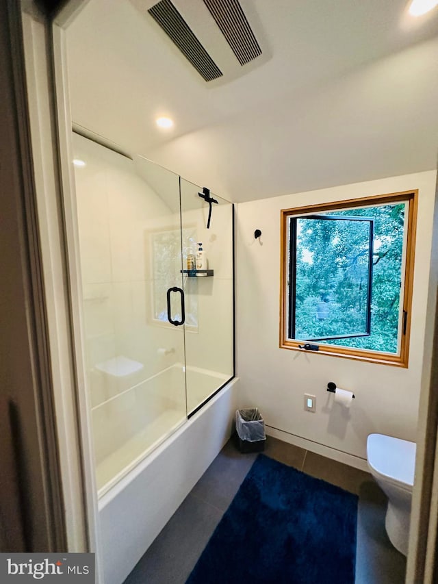 full bath with tile patterned floors, visible vents, and toilet