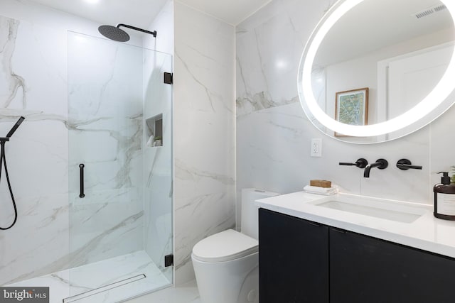 bathroom featuring a marble finish shower, toilet, marble finish floor, and visible vents