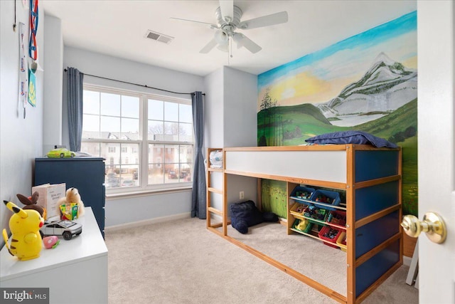 bedroom with visible vents, carpet floors, baseboards, and ceiling fan