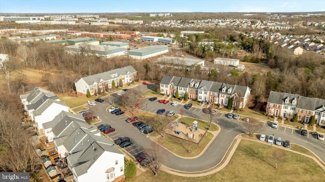 birds eye view of property with a residential view