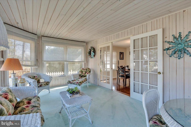 sunroom / solarium with wood ceiling and french doors