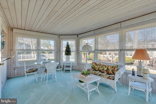 sunroom with wood ceiling