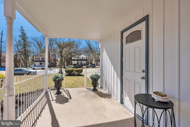 view of patio featuring a porch