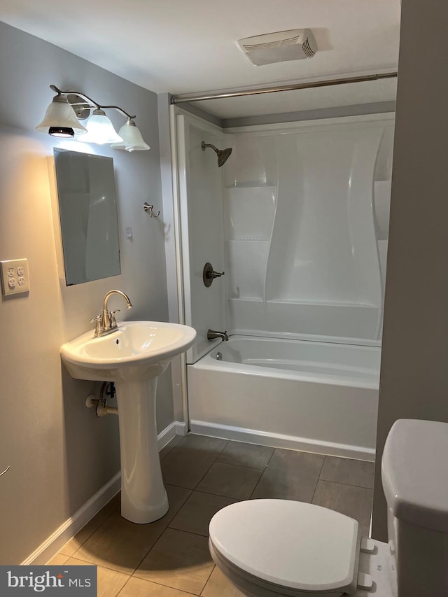 bathroom with tile patterned flooring, toilet, visible vents, and shower / washtub combination