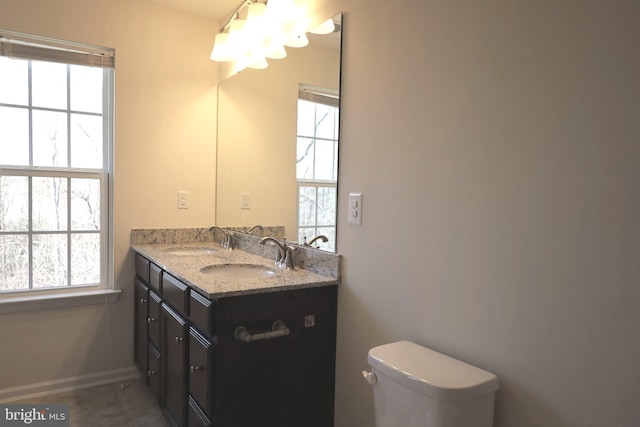 full bathroom with a sink and a healthy amount of sunlight