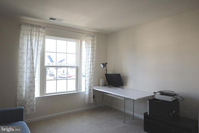 office with visible vents, carpet, and baseboards