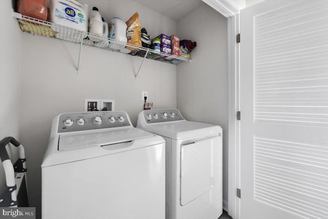 laundry area featuring laundry area and washer and dryer