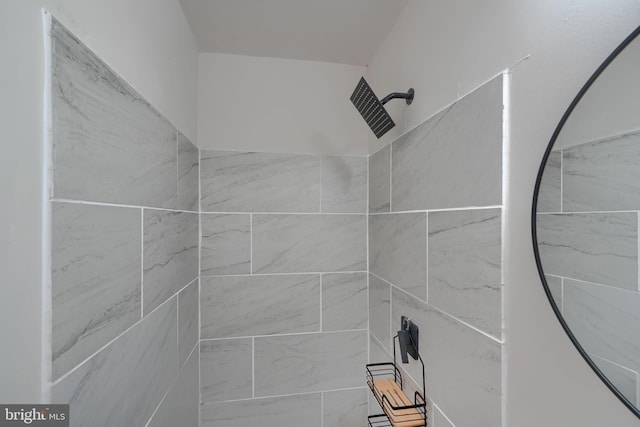 details with a tile shower