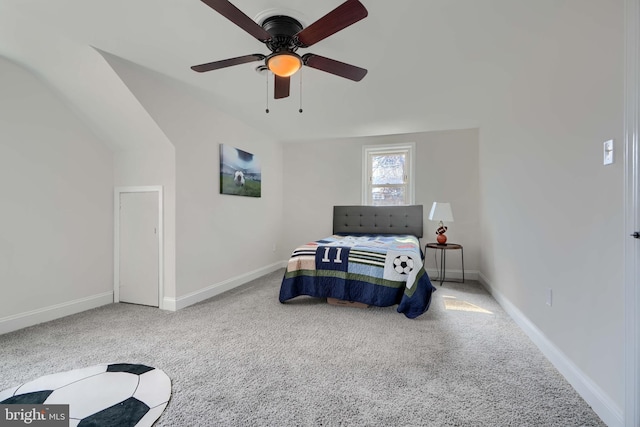 bedroom featuring baseboards, a ceiling fan, and carpet flooring