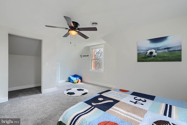 bedroom featuring visible vents, baseboards, lofted ceiling, carpet floors, and a ceiling fan