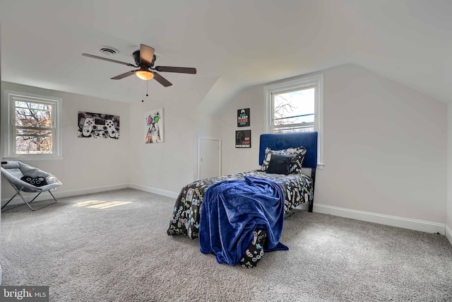 bedroom with visible vents, multiple windows, and carpet