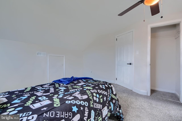 bedroom featuring visible vents, ceiling fan, baseboards, lofted ceiling, and carpet flooring