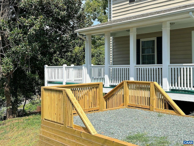 wooden deck featuring covered porch