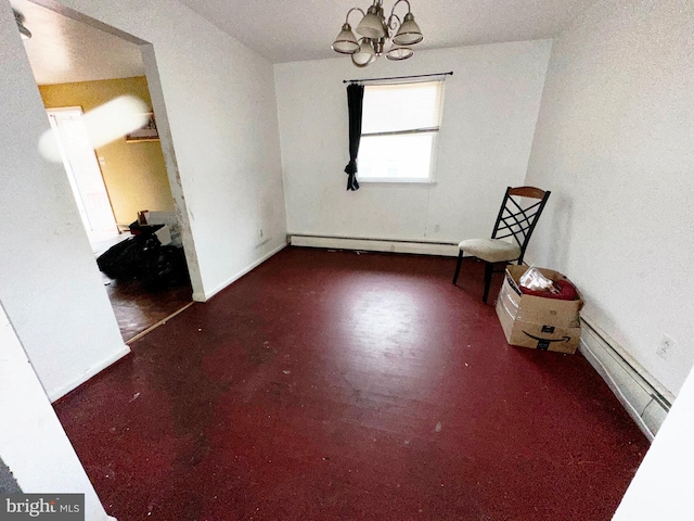 interior space with a notable chandelier, baseboards, and a baseboard radiator