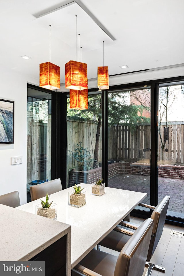 dining room featuring plenty of natural light