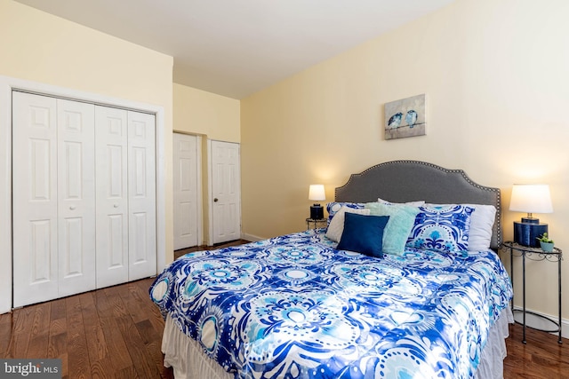 bedroom featuring a closet and wood finished floors