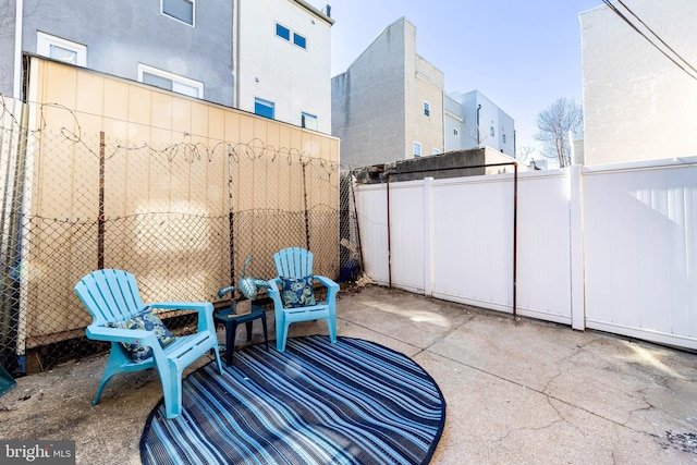 view of patio with a fenced backyard