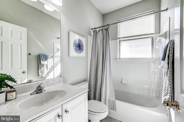 full bath featuring shower / bath combination with curtain, toilet, and vanity