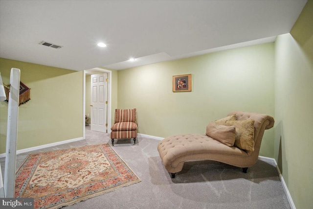 sitting room with recessed lighting, visible vents, baseboards, and carpet