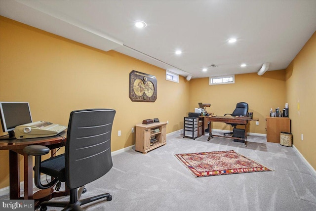 carpeted office space featuring recessed lighting and baseboards