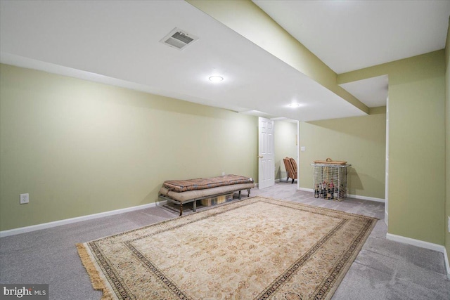 interior space featuring visible vents, carpet flooring, and baseboards