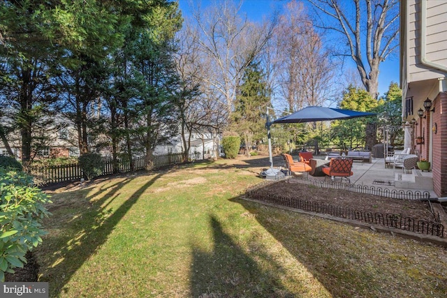 view of yard featuring a patio area and fence