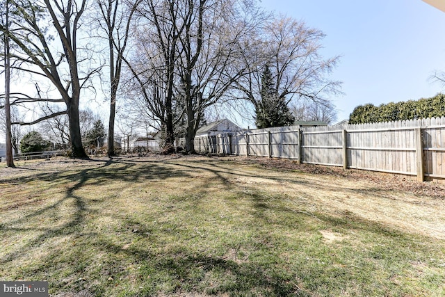 view of yard featuring fence