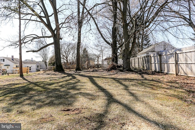 view of yard with fence