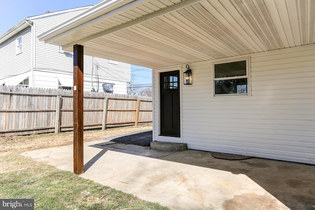 exterior space featuring a patio and fence