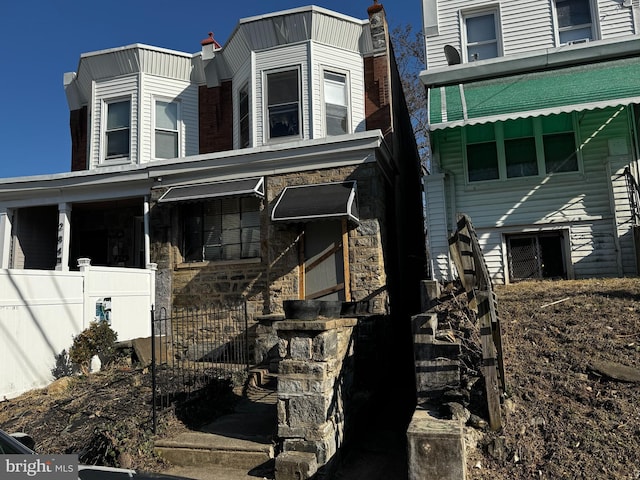 view of front of property featuring stone siding