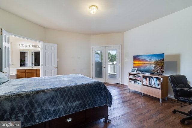 bedroom featuring french doors, dark wood-type flooring, ensuite bathroom, and access to outside