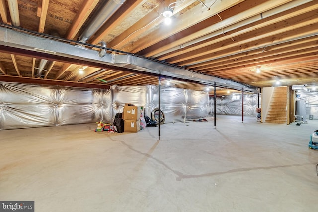 unfinished basement with water heater