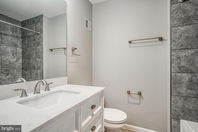 full bath with vanity, toilet, a shower, and visible vents