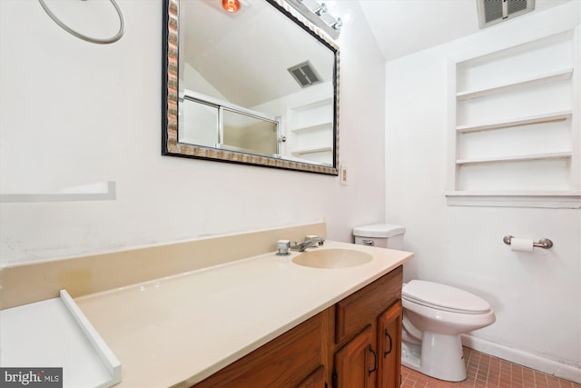 bathroom featuring a shower with door, visible vents, toilet, and vanity