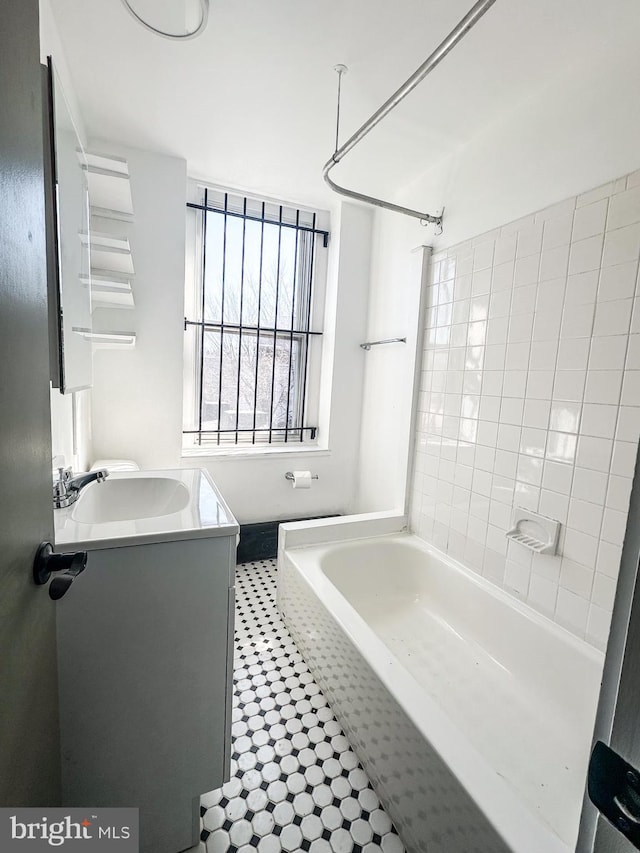 bathroom with  shower combination and vanity