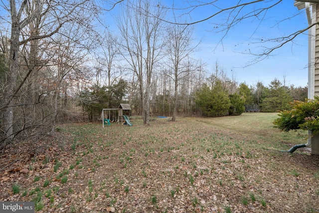 view of yard featuring a playground