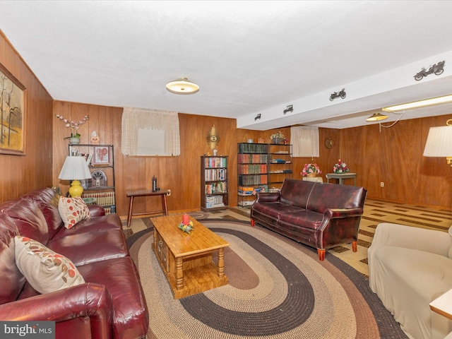 living area featuring wood walls