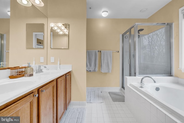 full bathroom featuring tile patterned floors, a stall shower, a sink, double vanity, and a bath