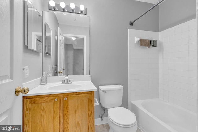 full bath featuring tile patterned flooring, baseboards, toilet, shower / bathing tub combination, and vanity