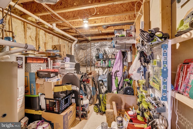 storage room featuring water heater