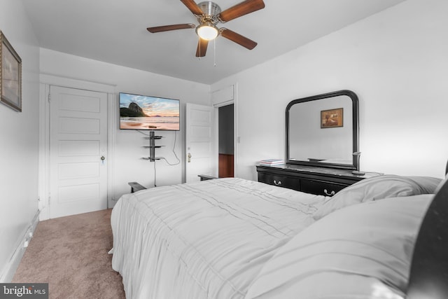 bedroom featuring a ceiling fan and carpet floors