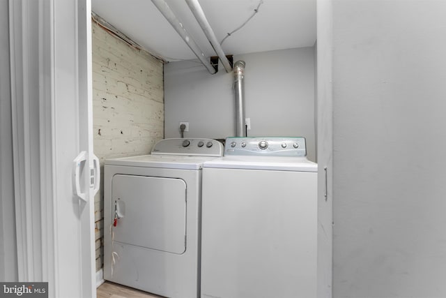 laundry room with washer and dryer