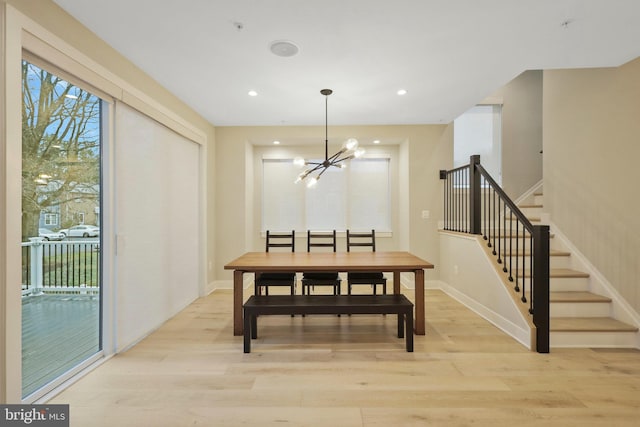 dining room with stairway, baseboards, light wood-style flooring, recessed lighting, and a notable chandelier