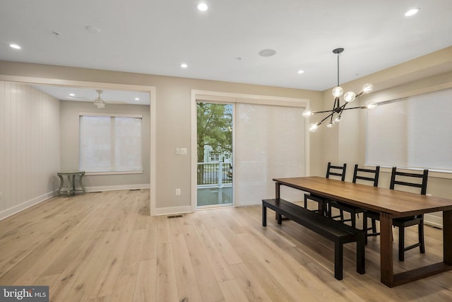 dining area with recessed lighting, baseboards, and light wood finished floors